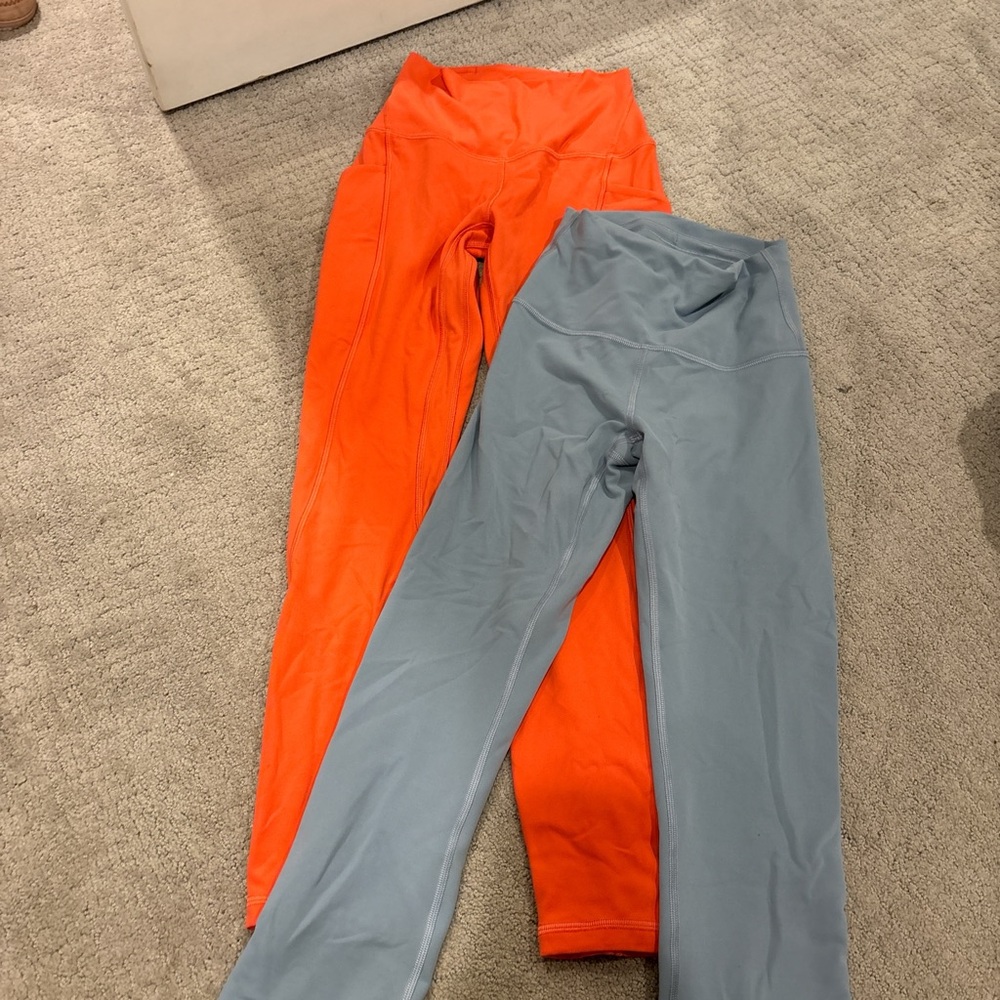 Pink redish and light blue lululemon leggings bundle 
Perfect condition 
Size 2